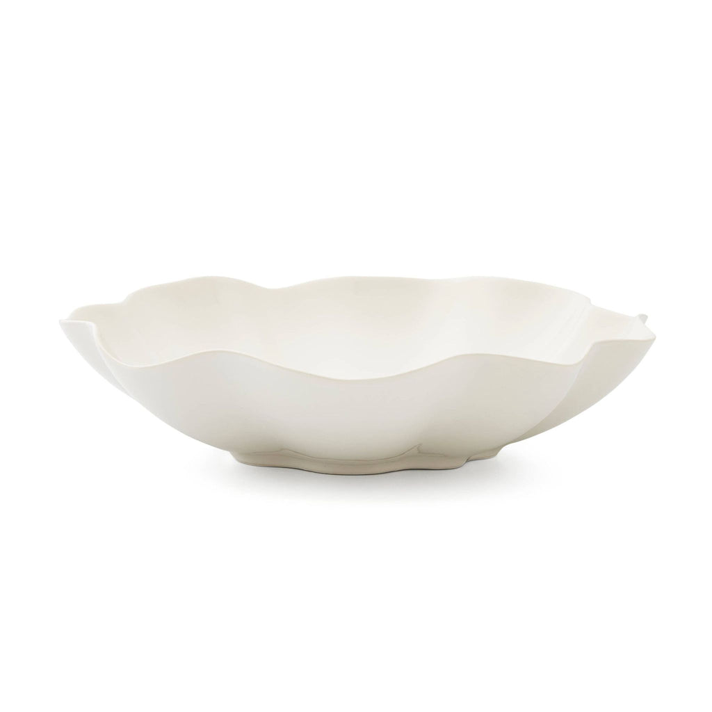 Large white serving bowl with scalloped wavy edges